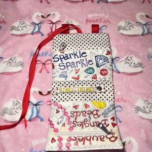 Colorful Jewelry Organizer with Red Ribbon